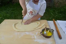 Making flat dough strip — image 1