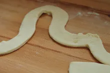 Making flat dough strip — image 2