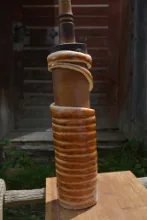 Taking off the cake from the baking spit — image 3